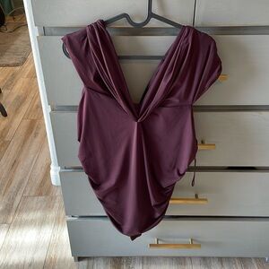 New with tags express body contour, plum color size extra large